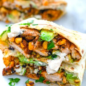 Chicken Avocado Burritos with Corn and Feta Sauce